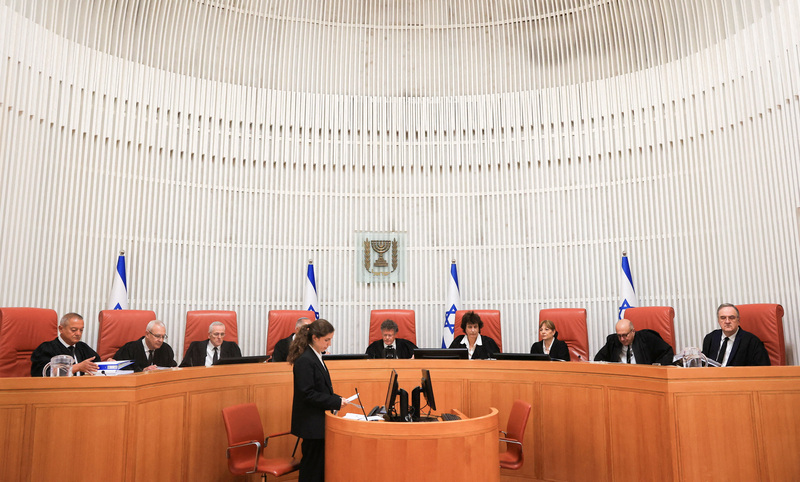 תשעה משופטי בית המשפט העליון. צילום: רויטרס