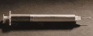 Cigarette in the shape of a syringe