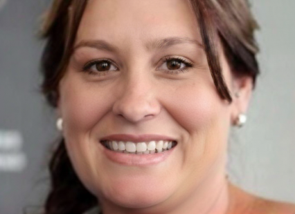 Headshot of Melissa smiling at the camera