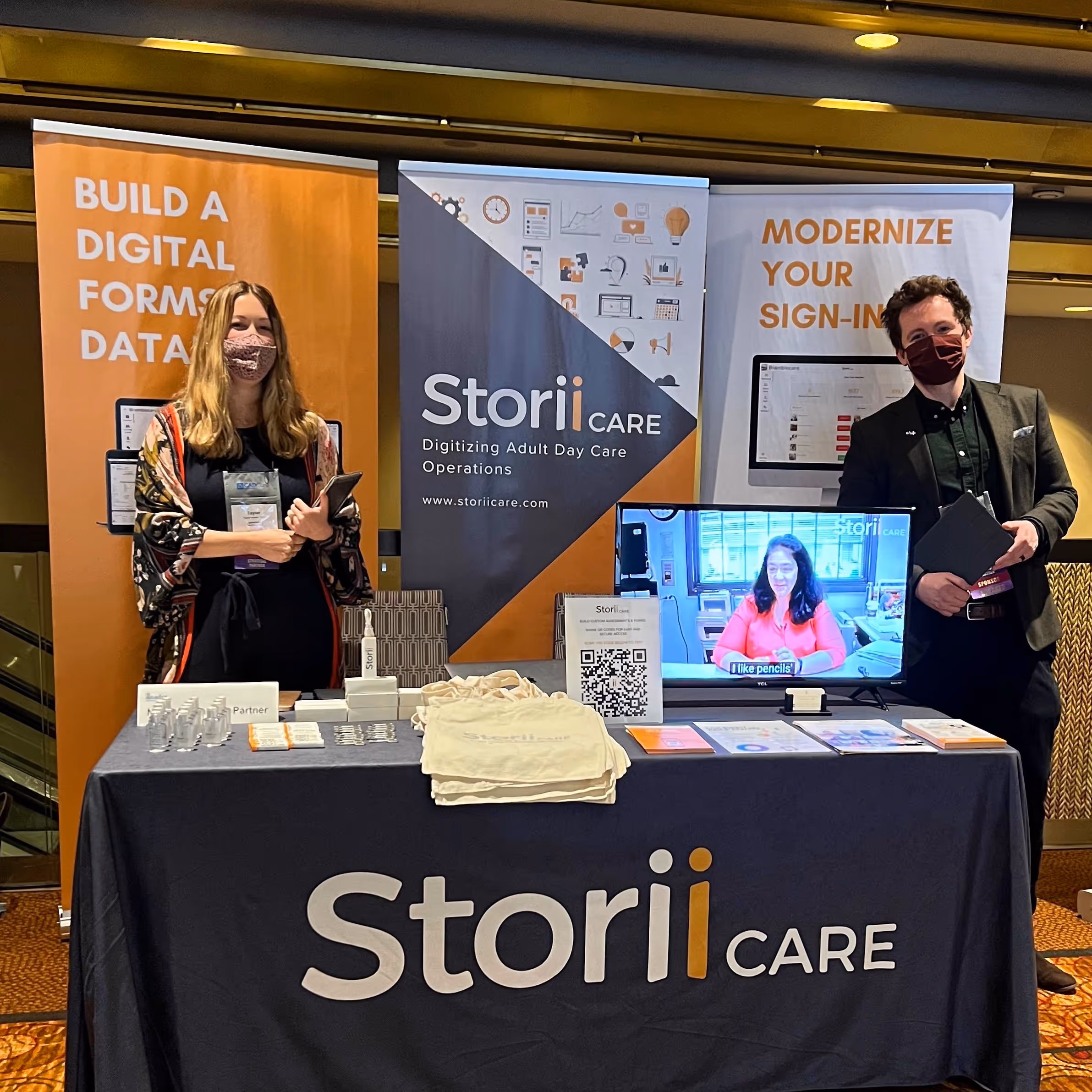 Storii's staff members at a conference