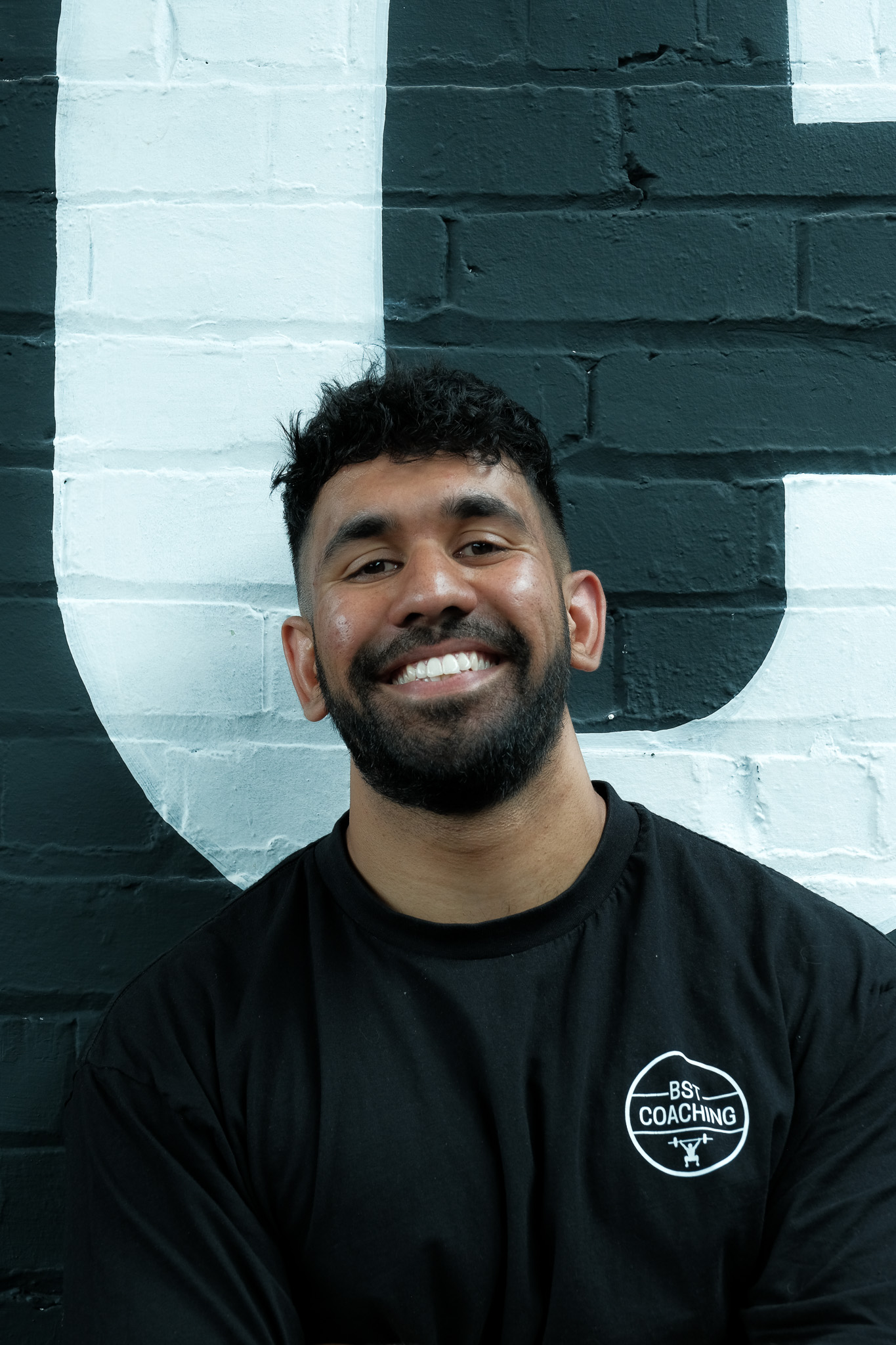 Client laughs with personal trainer 