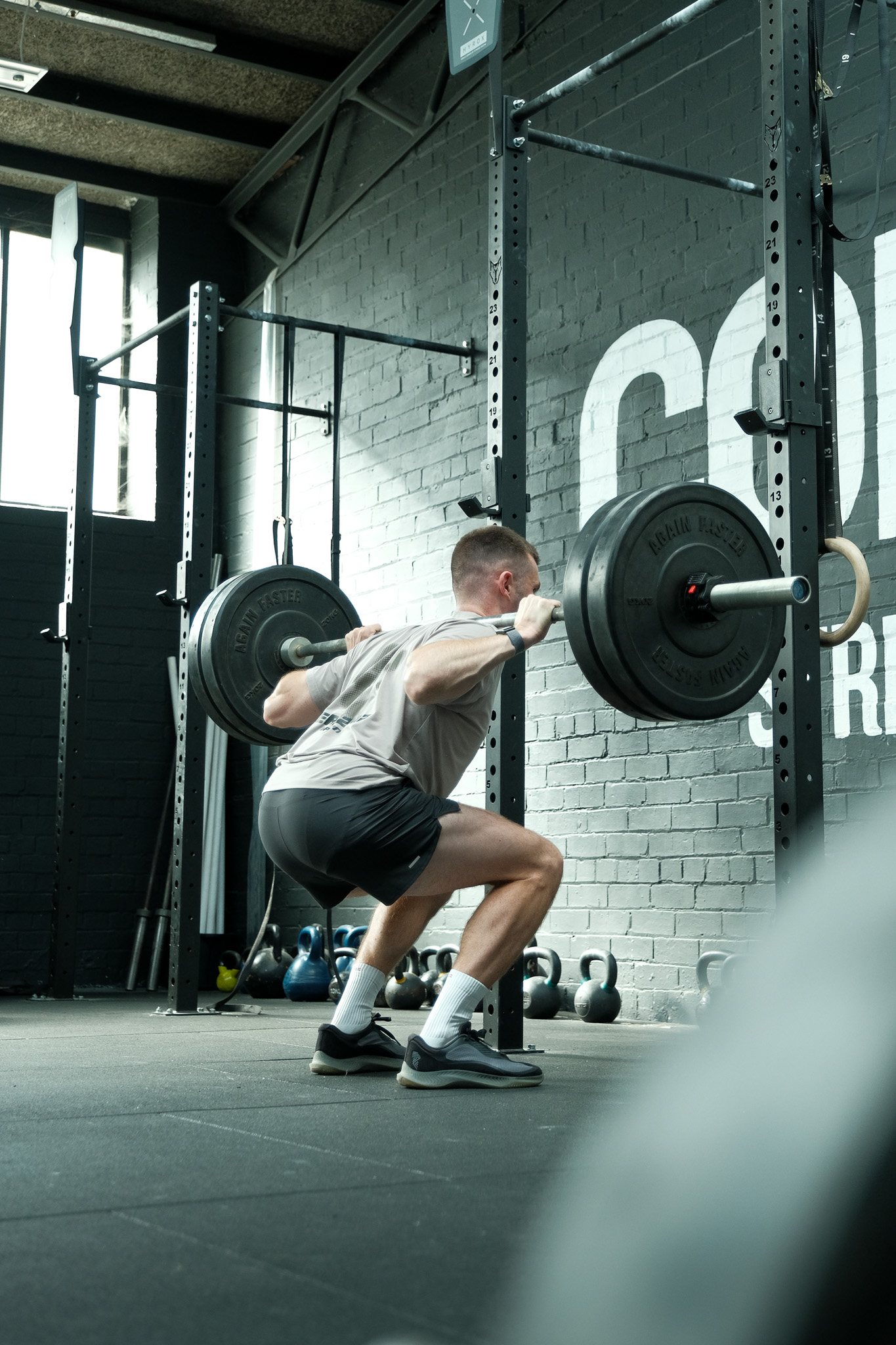 Client laughs with personal trainer