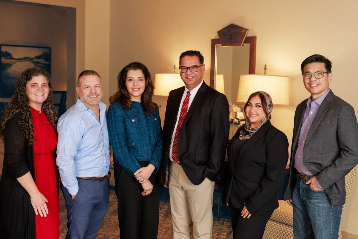 Six staff members from the Gregory Rhodes MD Cancer Center in professional attire