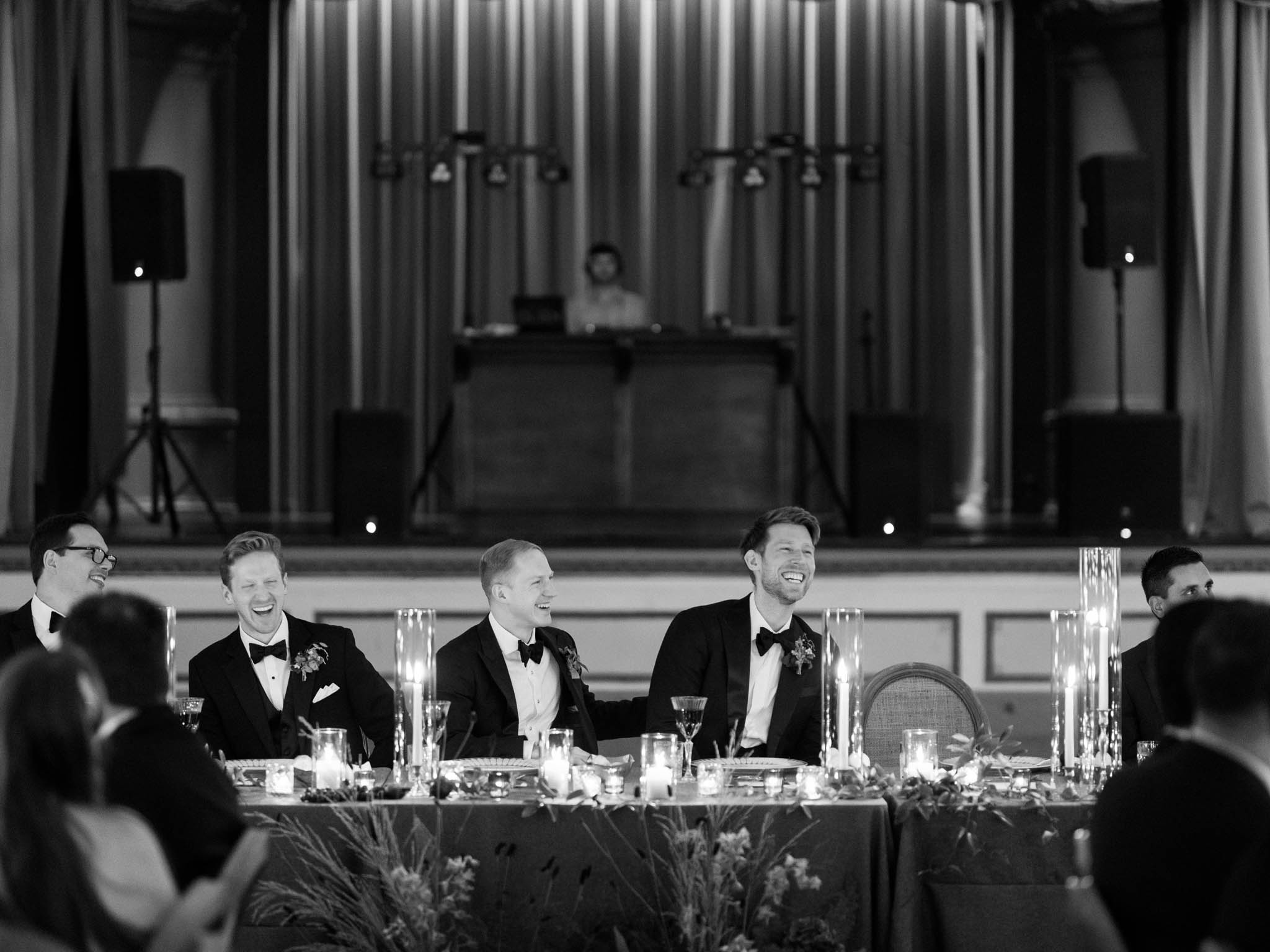 Candlelit reception design with long tables at Château Frontenac wedding in Quebec City
