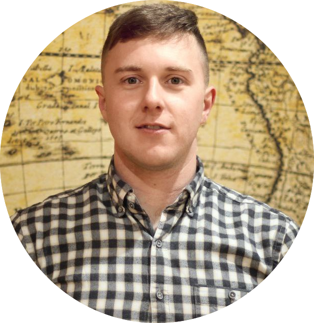 A picture of Angga Manuwangsa in a collared shirt.