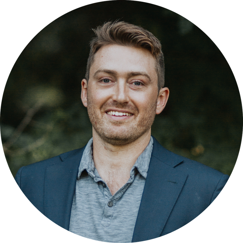 A picture of Josh Suhr in a collared shirt.