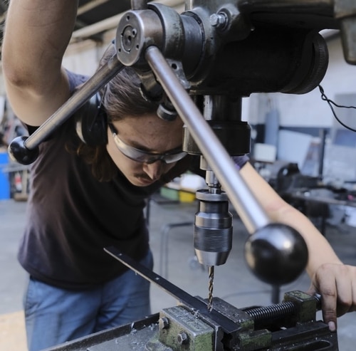 Man on a drill machine