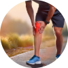Jogger clutching their sore lower leg, believing lactic acid makes them sore.
