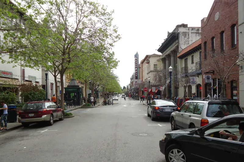 Cars park in the streets of Downtown Santa Cruz, California.