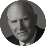 Professional headshot of Dr. Gregory Rhodes, founder and former president of BASS Medical Group.