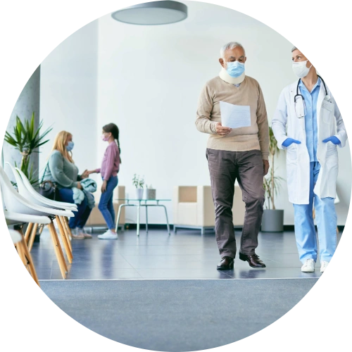 Senior patient with neck collar and his doctor analyzing medical report while walking through hallway at the urgent care clinic.