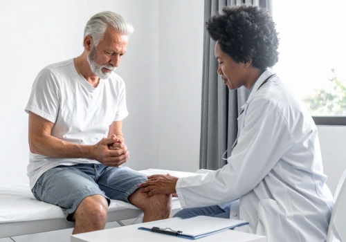Patient discussing arthritis pain management and treatment options with a healthcare provider.