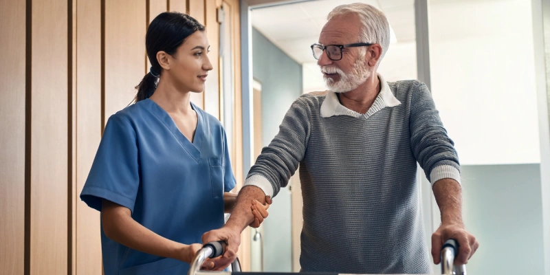 Parkinson’s patient receiving physical therapy to improve mobility.