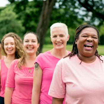 Women wearing pink clothing to promote breast cancer awareness during Breast Cancer Awareness Month.