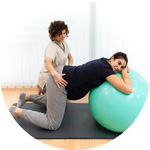 Patient working with a physical therapist on pelvic floor rehabilitation exercises