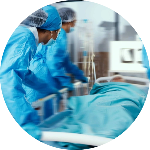 Patient with compartment syndrome being rushed into an operating room