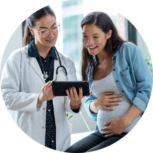 Pregnant patient receiving prenatal care during a checkup