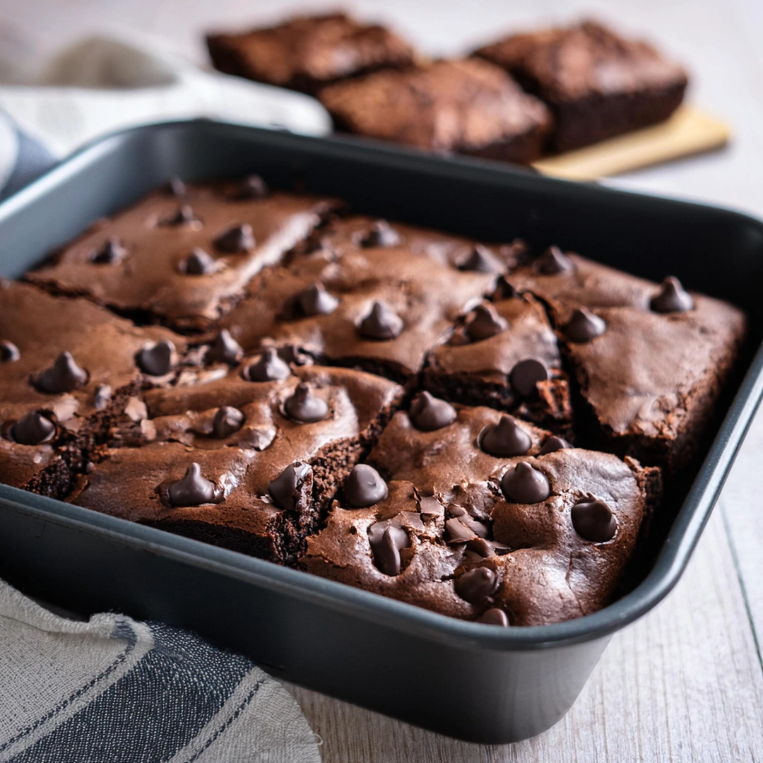brownies with chocolate chips in a baking pan