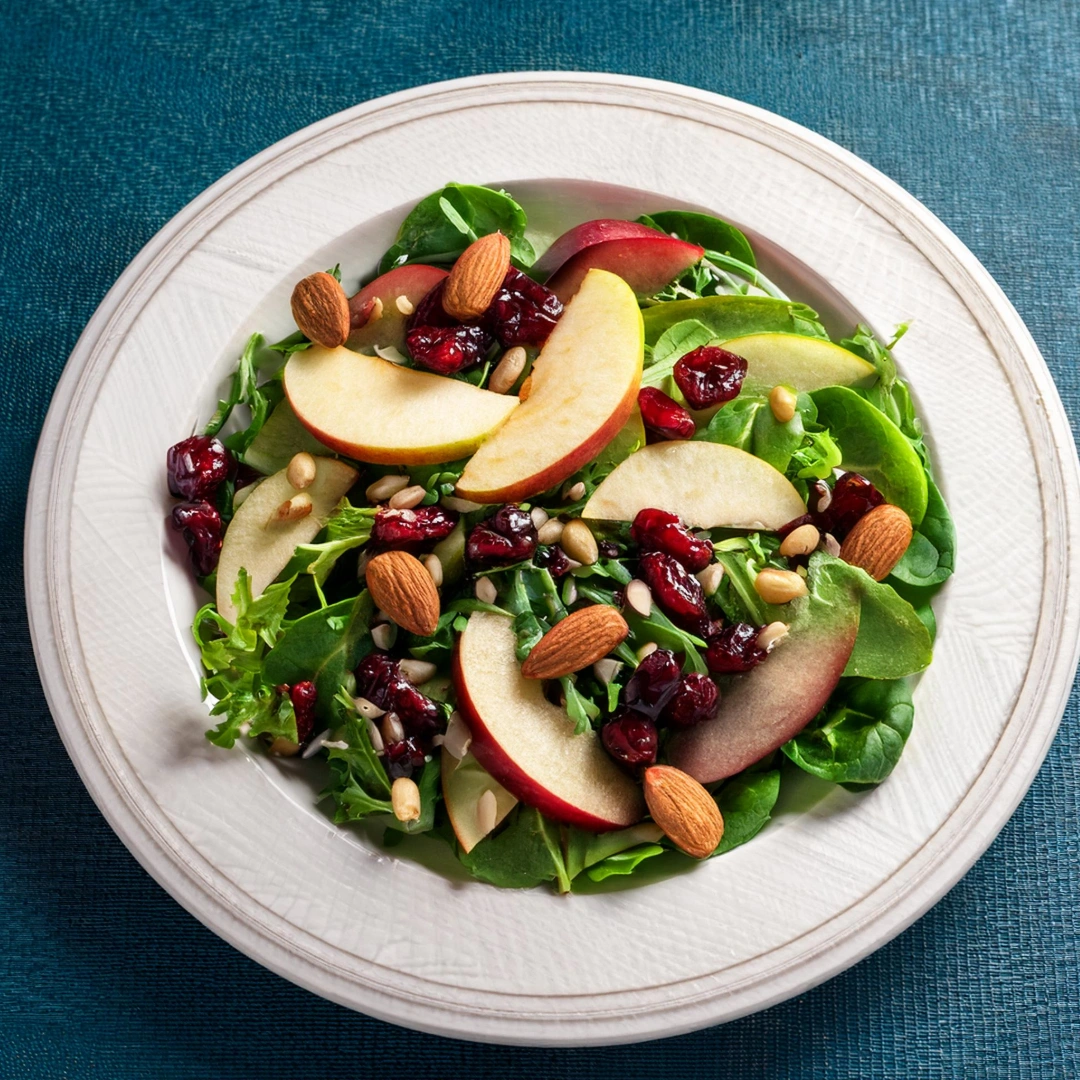 mixed greens salad with apple, pear, cranberries, walnuts, almonds, and sunflower seeds with balsamic dressing