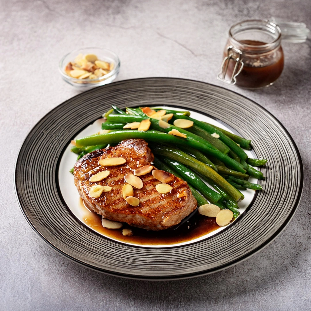 glazed pork chop and green beans almondine