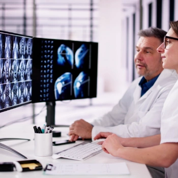 Radiologists examining imaging test results