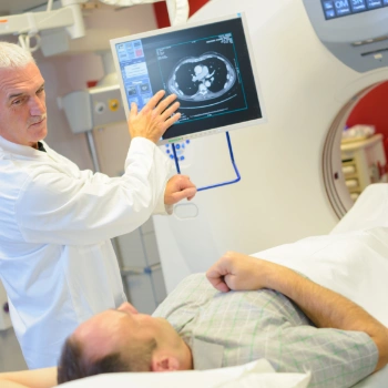 Doctor showing prostate scan results to a patient