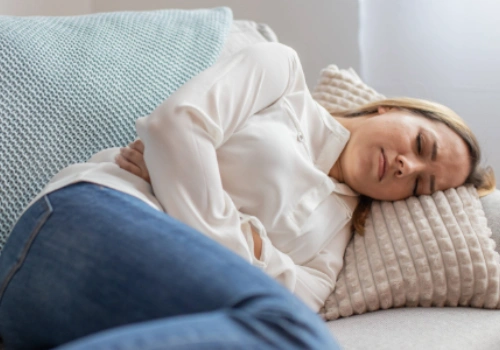 Woman cramping from endometriosis