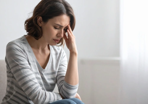 Woman experiencing brain fog from long COVID