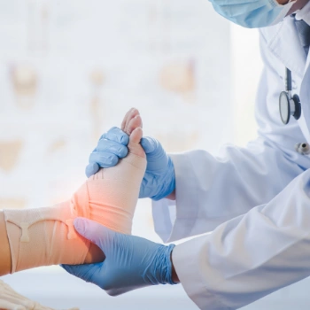 Orthopedic surgeon examining a foot injury