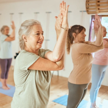 Elderly people doing yoga