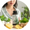 Debloating supplement bottle with digestive ingredients such as ginger, peppermint and probiotics