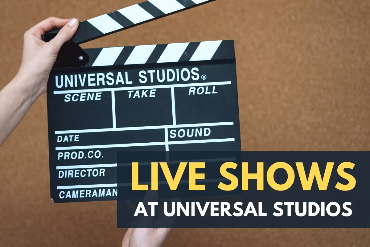 Hand holding a clapperboard - Live Shows at Universal Studios