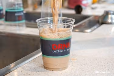 DRNK Coffee being poured in a cup