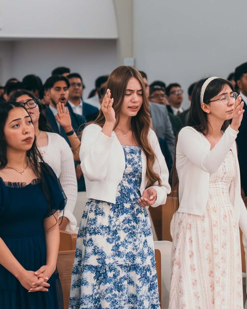 Young people worshiping during a Voice of Truth Tabernacle service
