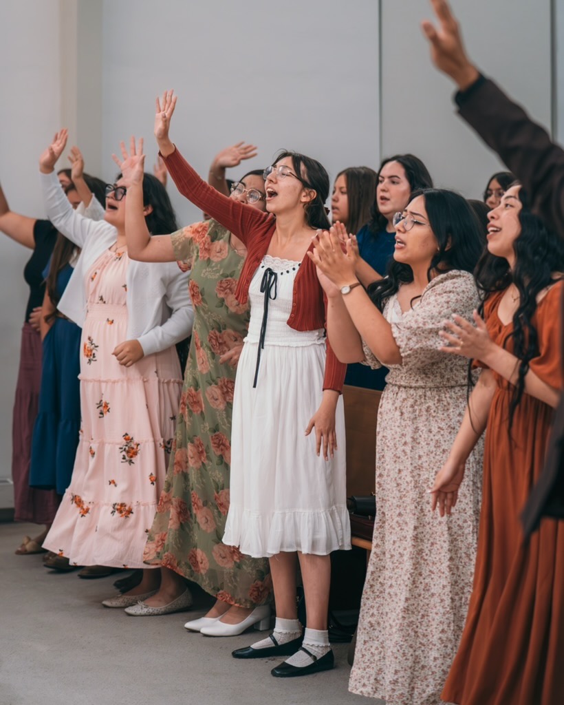 Young women worshiping together at Voice of Truth Tabernacle
