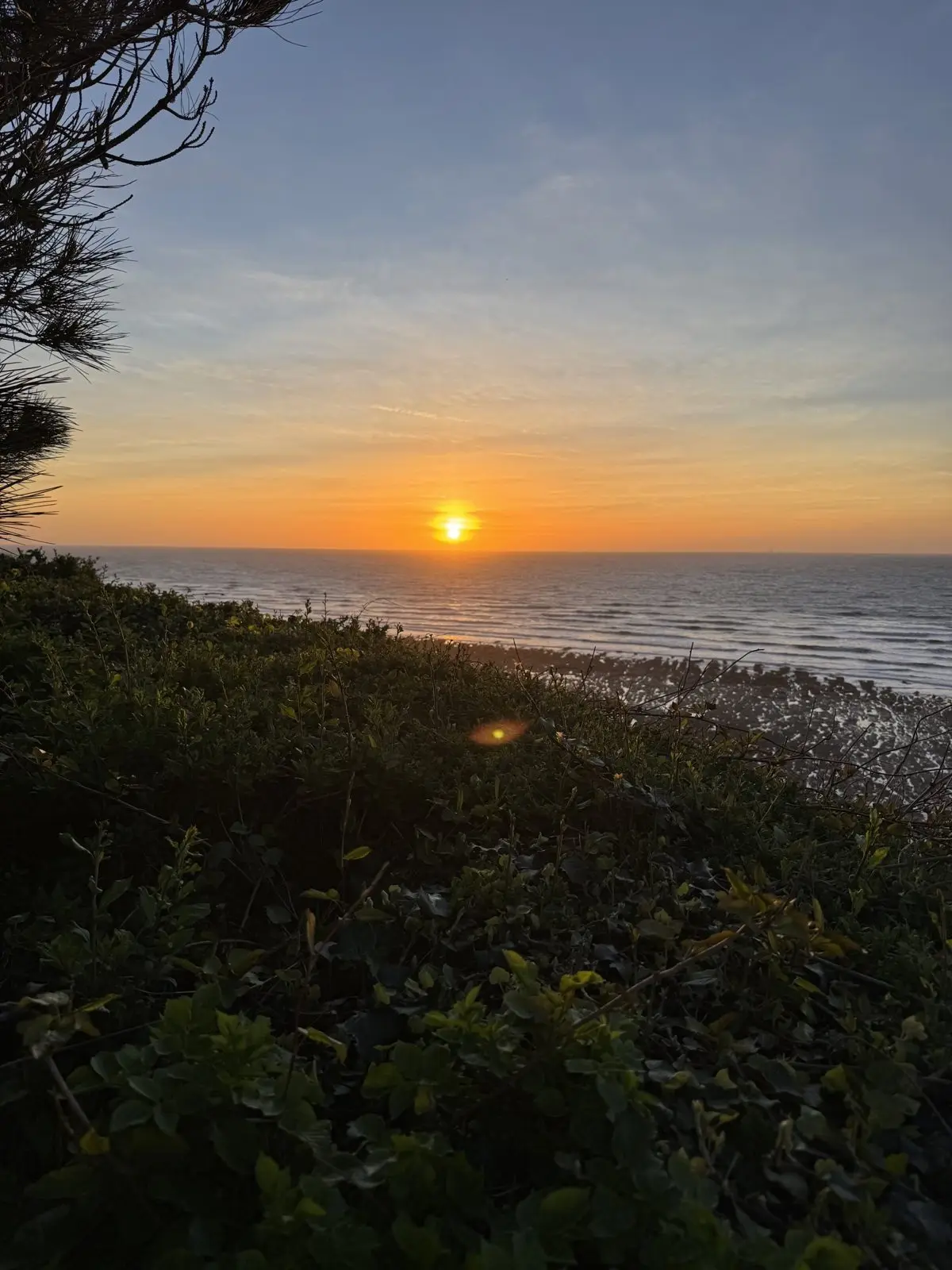 Coucher de soleil sur la Manche depuis la falaise d'Ault au Bois de Cise
