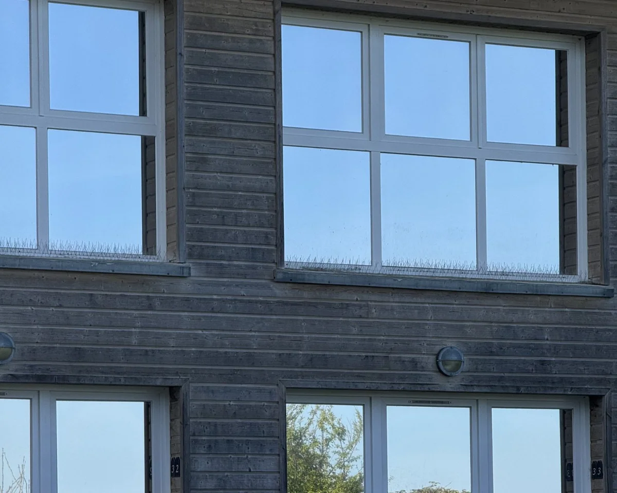 Façade en bois d'une villa de l'hôtel Le Cise à Ault