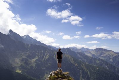 image of a person on top of mountain
