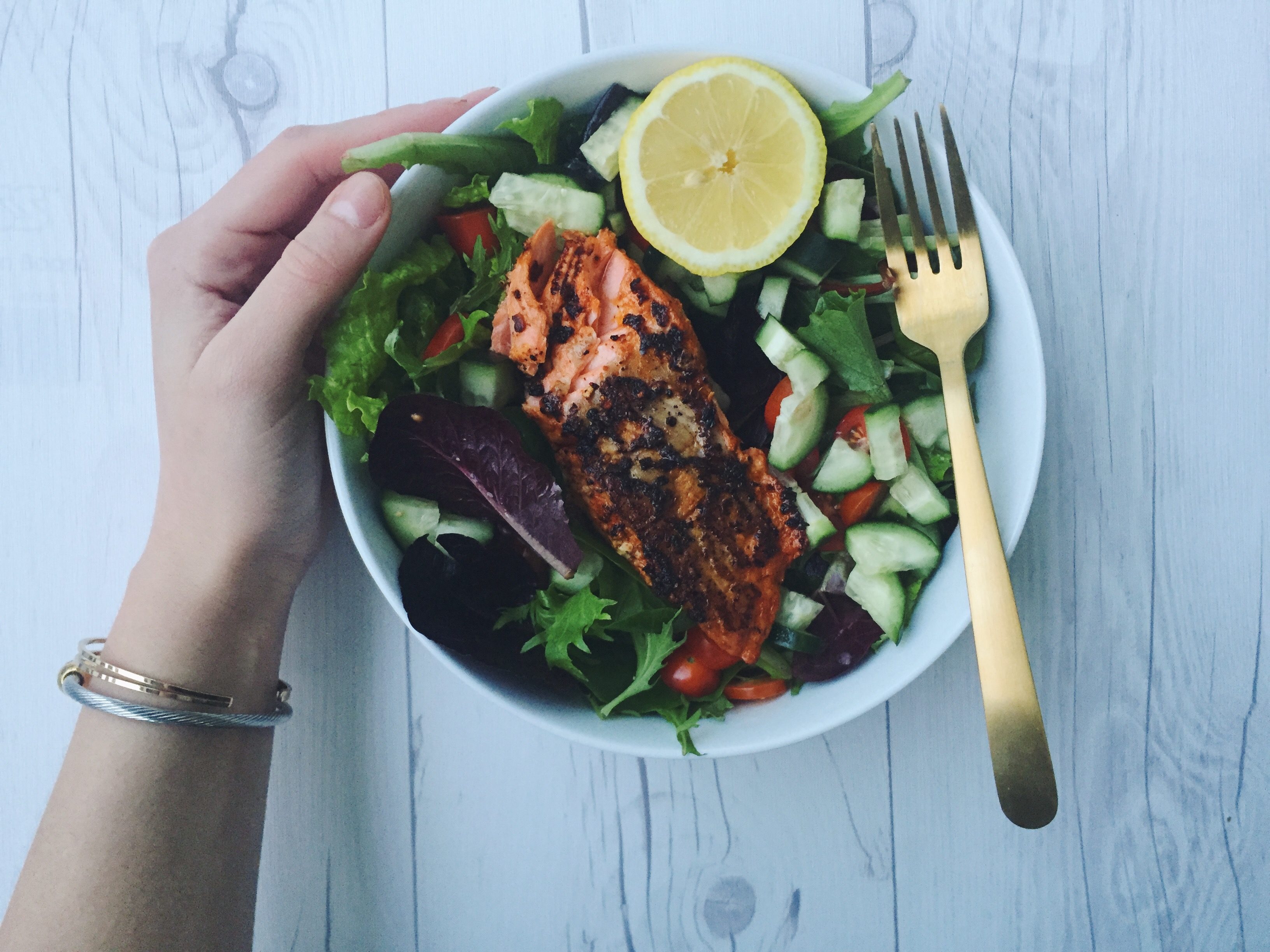 Salmon salad with olive oil dressing