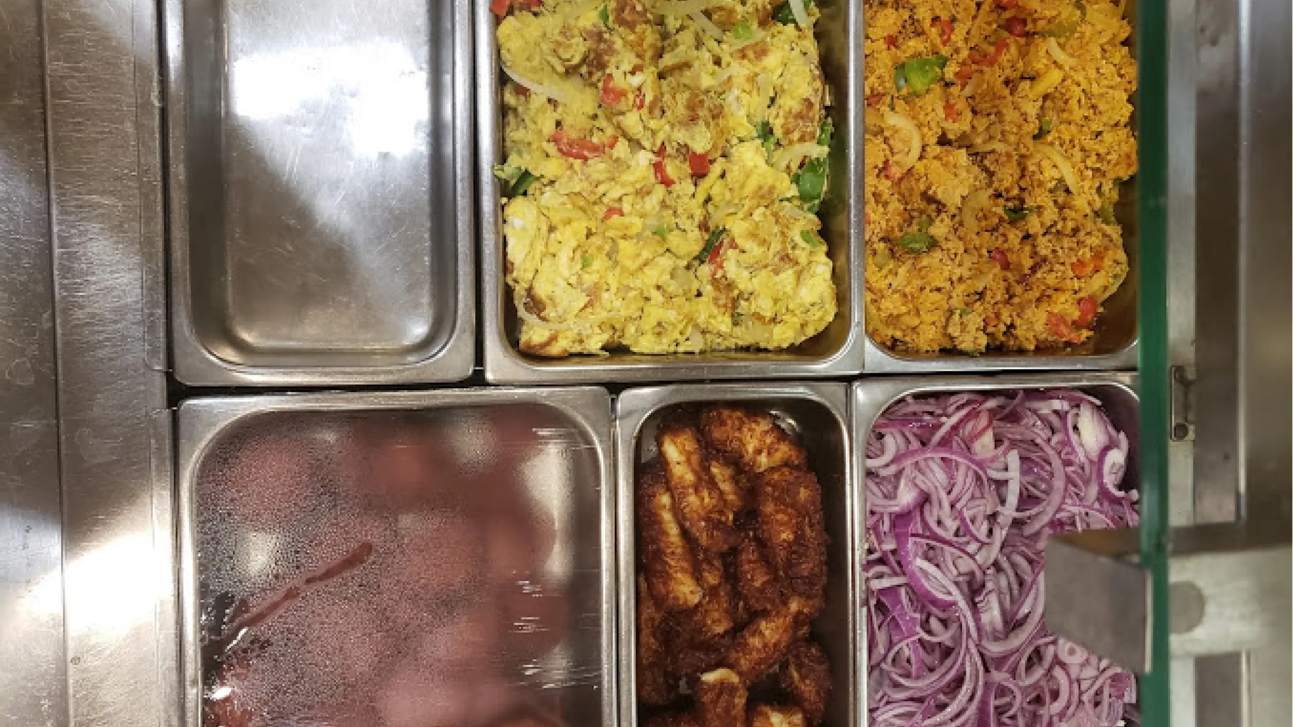Screenshot of fried cheese, red onions, scrambled eggs, and salami.