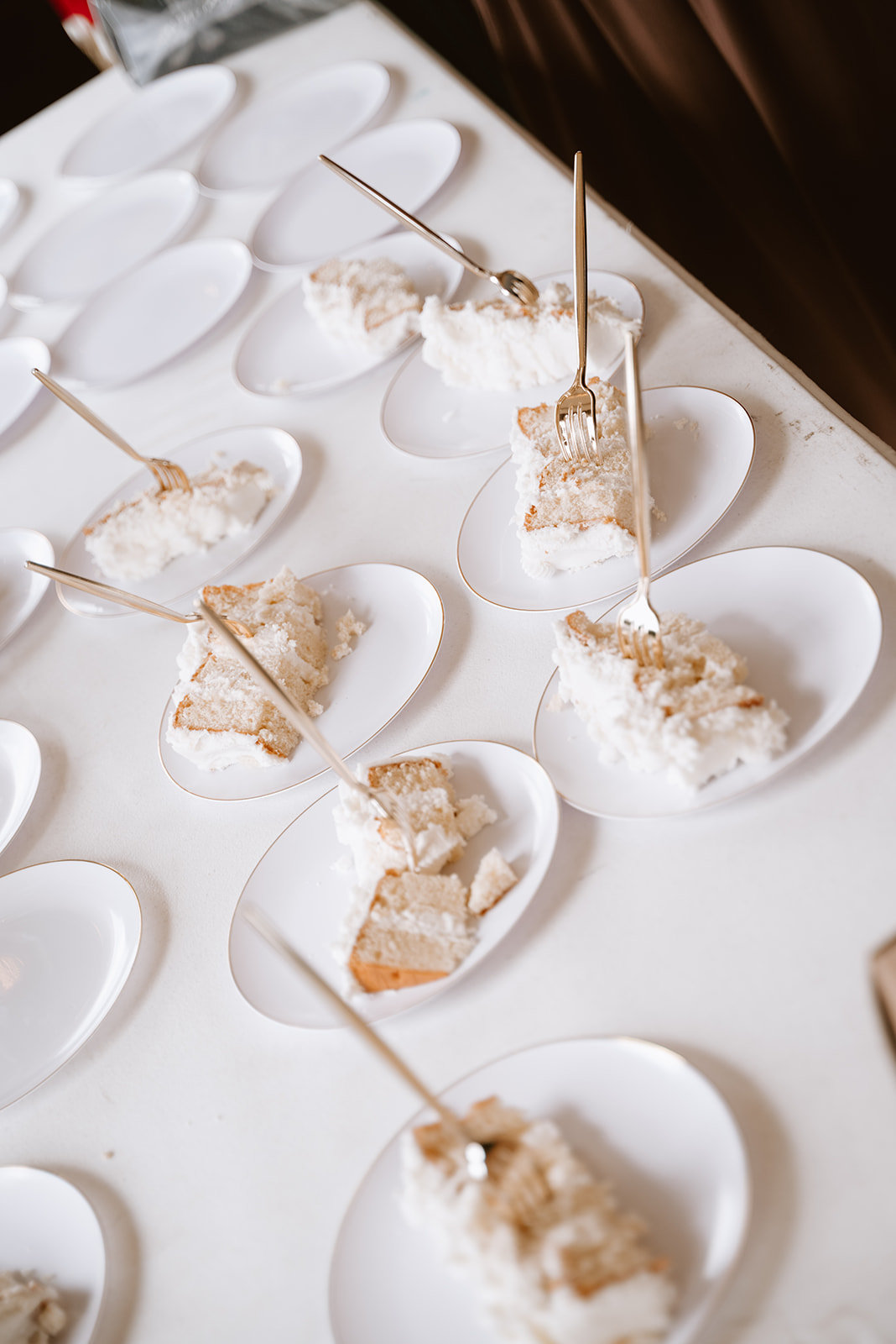 Wedding cake slices ready for the guests at a wedding reception in Gunter, Texas. 