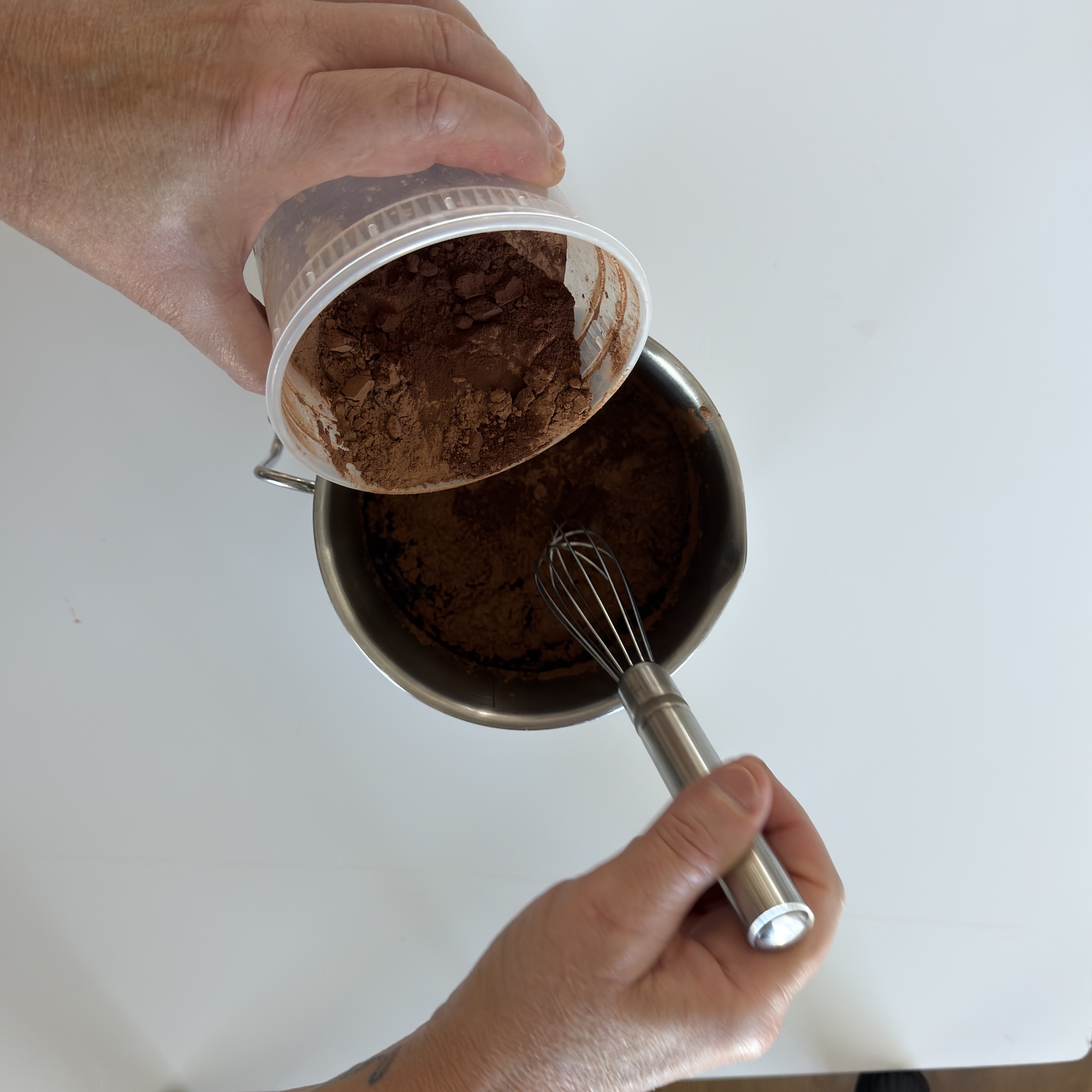 Add the Signature cocoa blend to the Dr. Pepper®. Whisk until the cocoa blend is completely incorporated. It should look like chocolate syrup. This step is called “blooming” your cocoa.