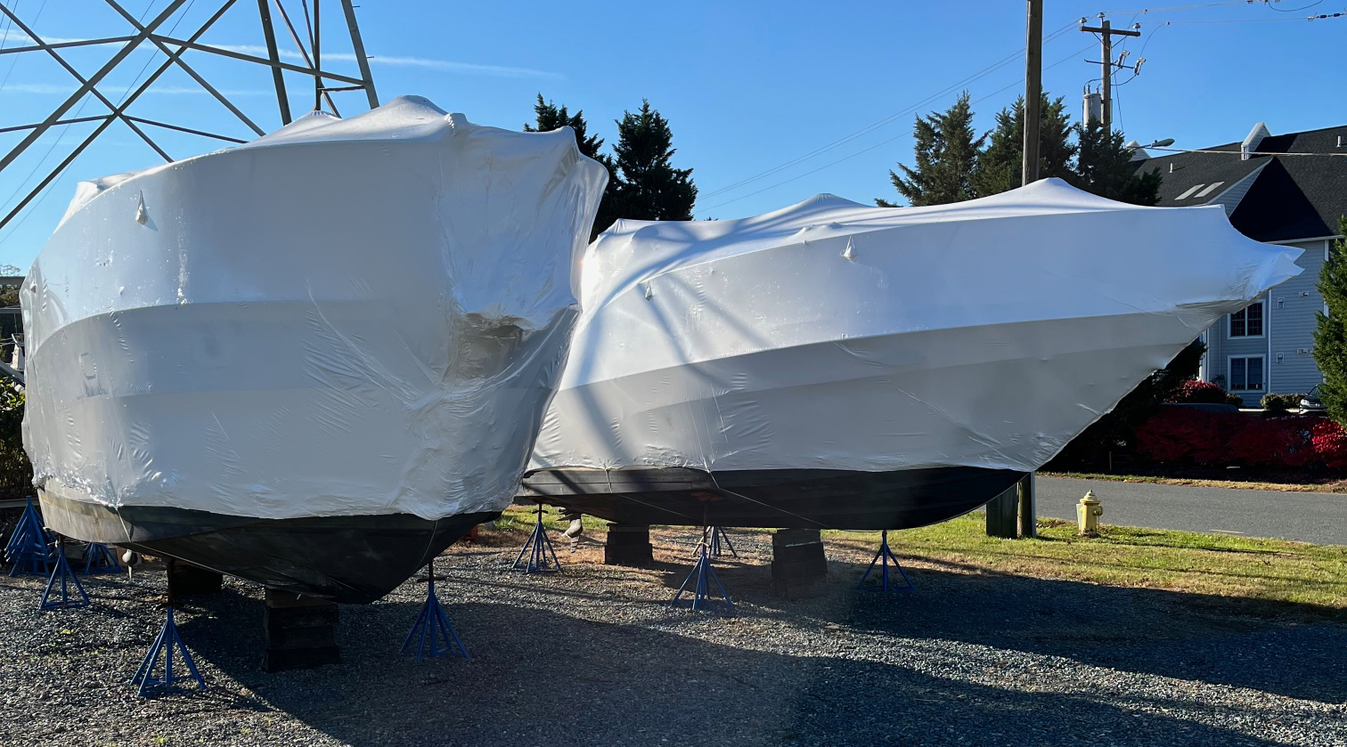 Boats shrink-wrapped for winter storage at Captain Lee's Marina
