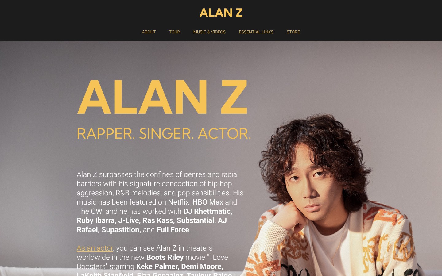 Homepage of alanzmusic.com: ALAN Z in yellow display type over a portrait of the artist, with the tagline Rapper. Singer. Actor.
