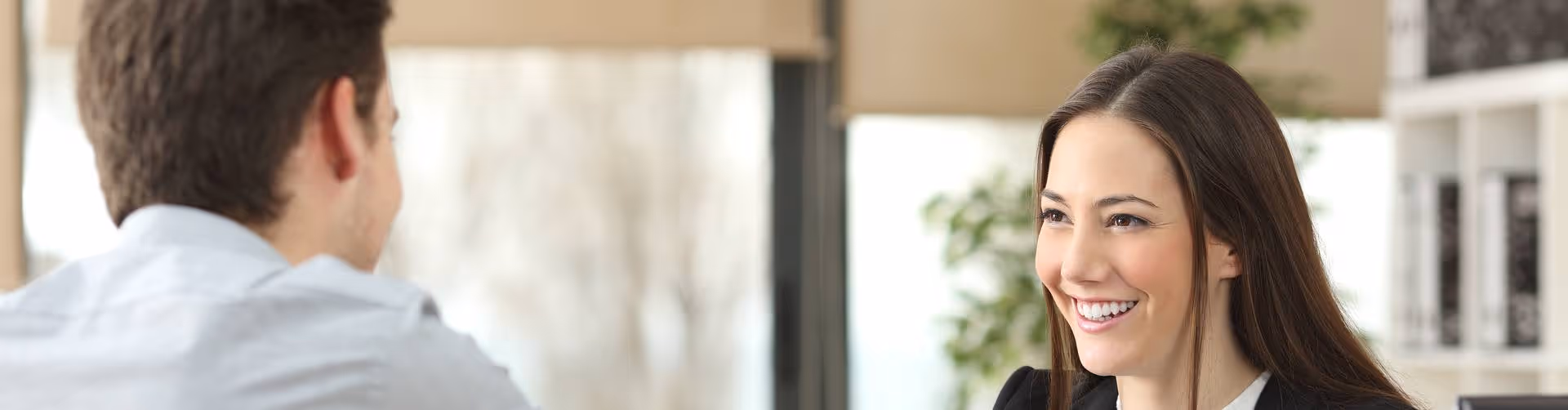 man & woman engaged in an interview