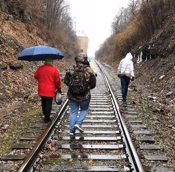 Community members participating in supervised work