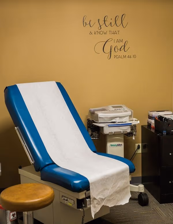 The City Mission's head nurse examines a resident