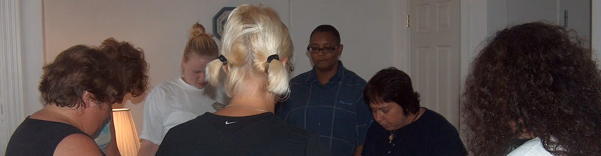group of resident females engaged in prayer