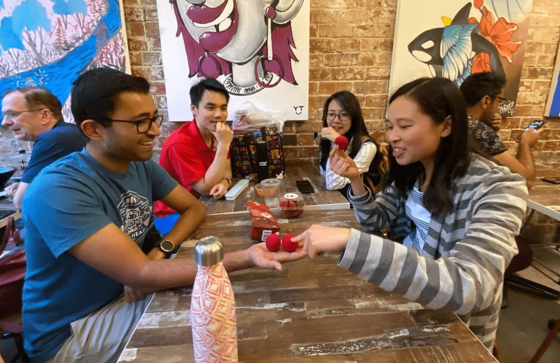 Image of me showing some sponge ball magic to a friend