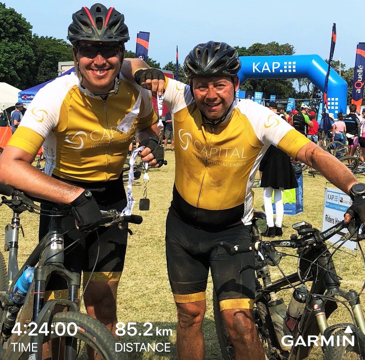 Nick Kohne and Anthony Long at the finish of Sani2C